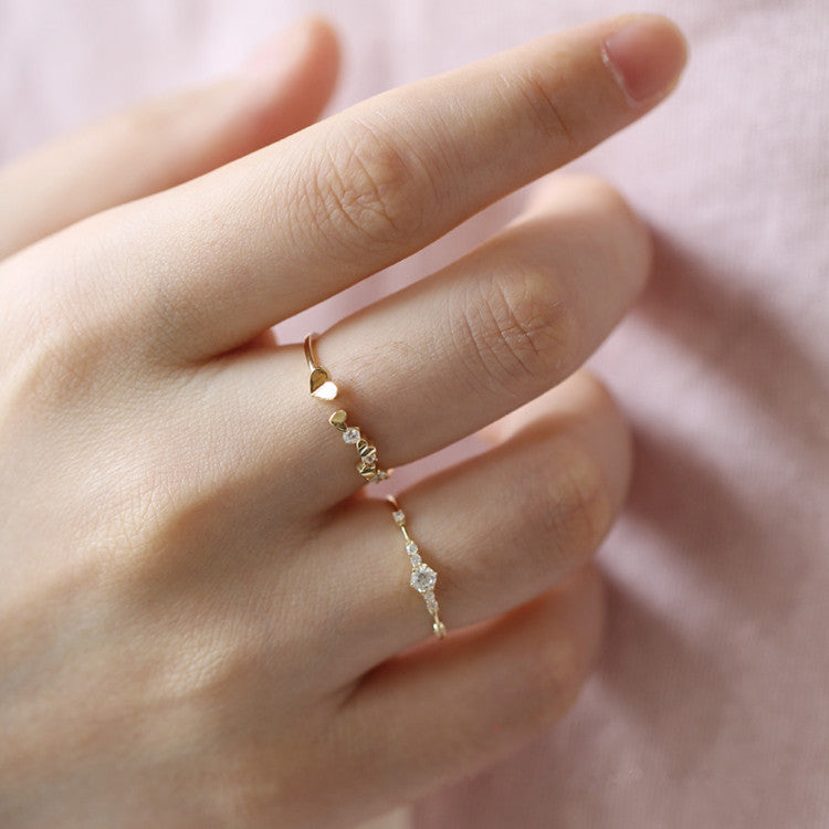 S925 sterling silver plated with 14K gold 7 tiny diamond rings