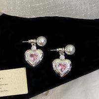 Star-themed earrings with zircon accents and a matching necklace set.