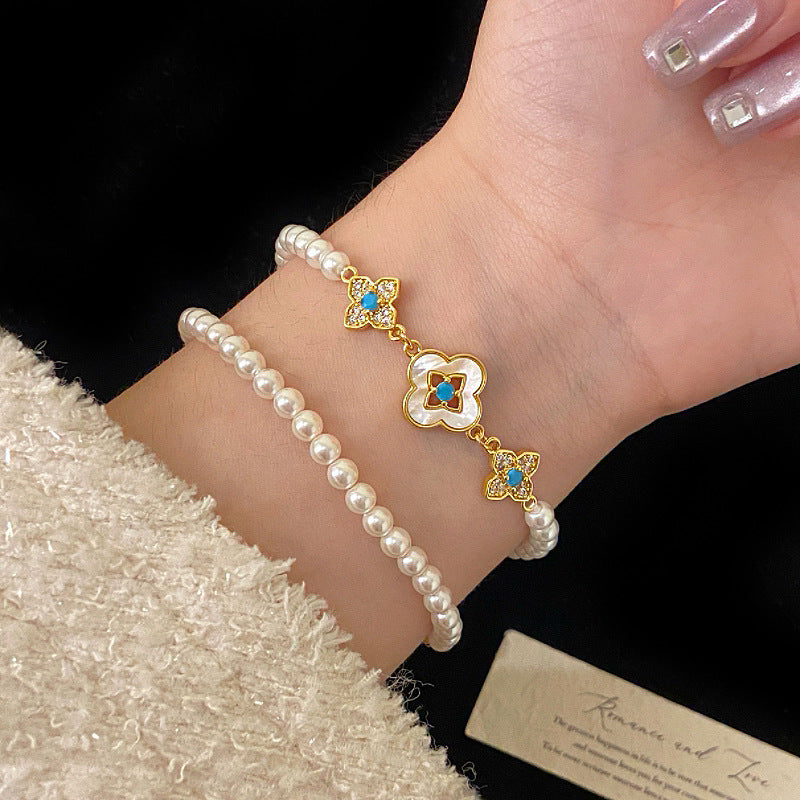 Natural Fritillaria shell with four leaves full of diamonds Swarovski pearl bracelet