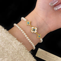 Natural Fritillaria shell with four leaves full of diamonds Swarovski pearl bracelet