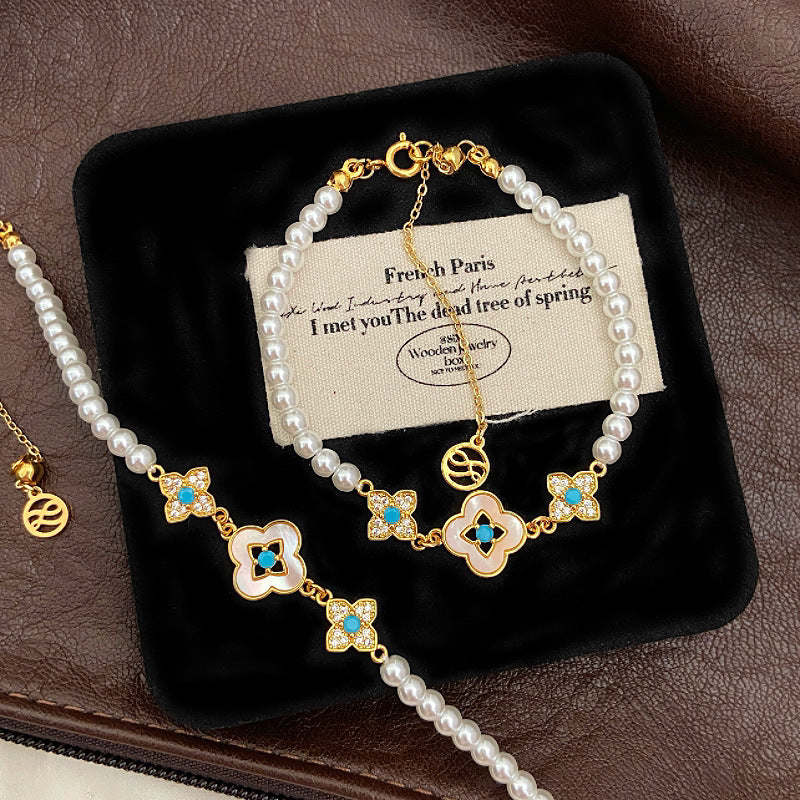 Natural Fritillaria shell with four leaves full of diamonds Swarovski pearl bracelet