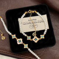 Natural Fritillaria shell with four leaves full of diamonds Swarovski pearl bracelet