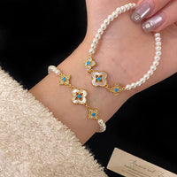 Natural Fritillaria shell with four leaves full of diamonds Swarovski pearl bracelet