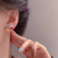 Zircon diamond-encrusted drop oil color earrings