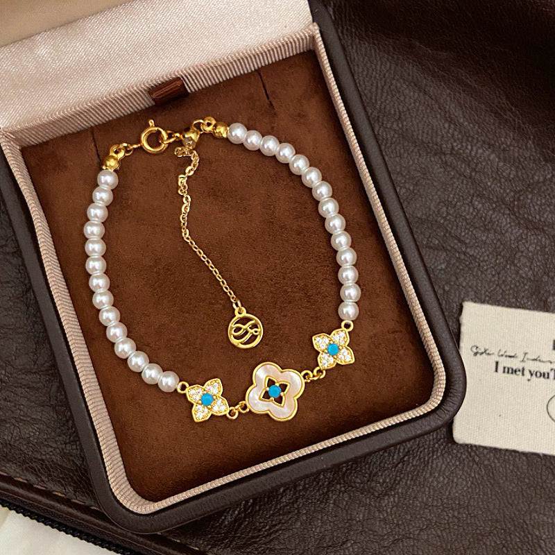 Natural Fritillaria shell with four leaves full of diamonds Swarovski pearl bracelet