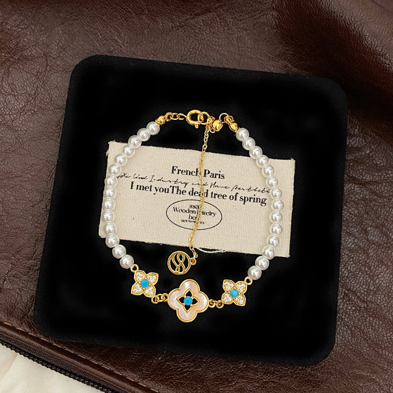 Natural Fritillaria shell with four leaves full of diamonds Swarovski pearl bracelet