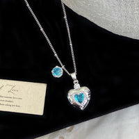 Star-themed earrings with zircon accents and a matching necklace set.