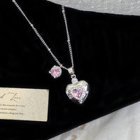Star-themed earrings with zircon accents and a matching necklace set.