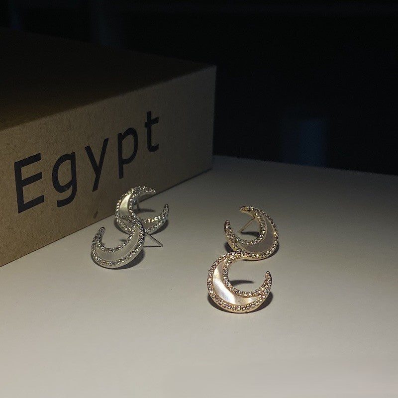 Moon studded shell earrings