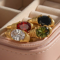Stainless Steel Waterproof 3A Winding Pattern Oval Zircon Ring