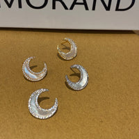 Moon studded shell earrings