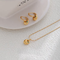 Emerald zircon necklace sand gold earrings