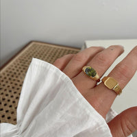 Stainless Steel Waterproof 3A Winding Pattern Oval Zircon Ring